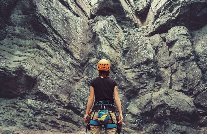 woman about to rock climb